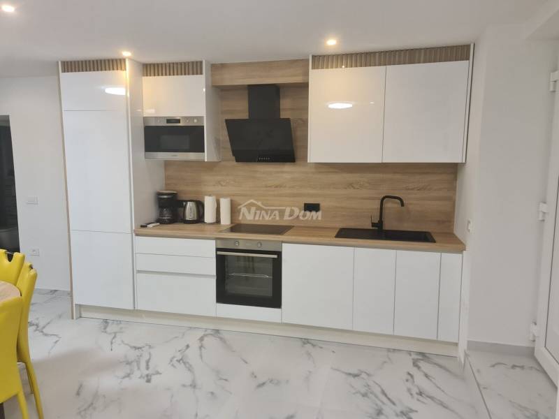 Apartman trosoban u prizemlju - 2