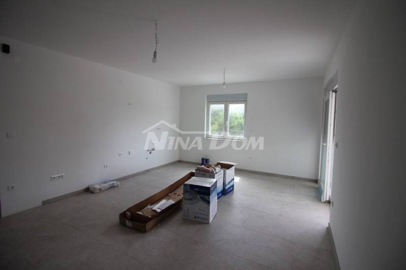 Newly built three-room apartments 150 meters from the sea. - 9