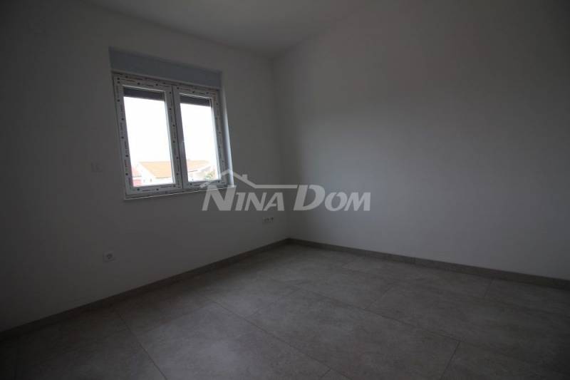 Newly built three-room apartments 150 meters from the sea. - 13