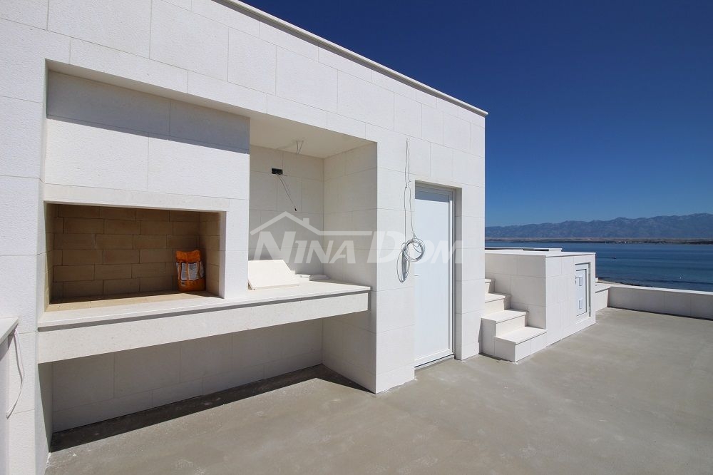 Villa near the sea, with a pool on the ground floor and on the roof terrace.